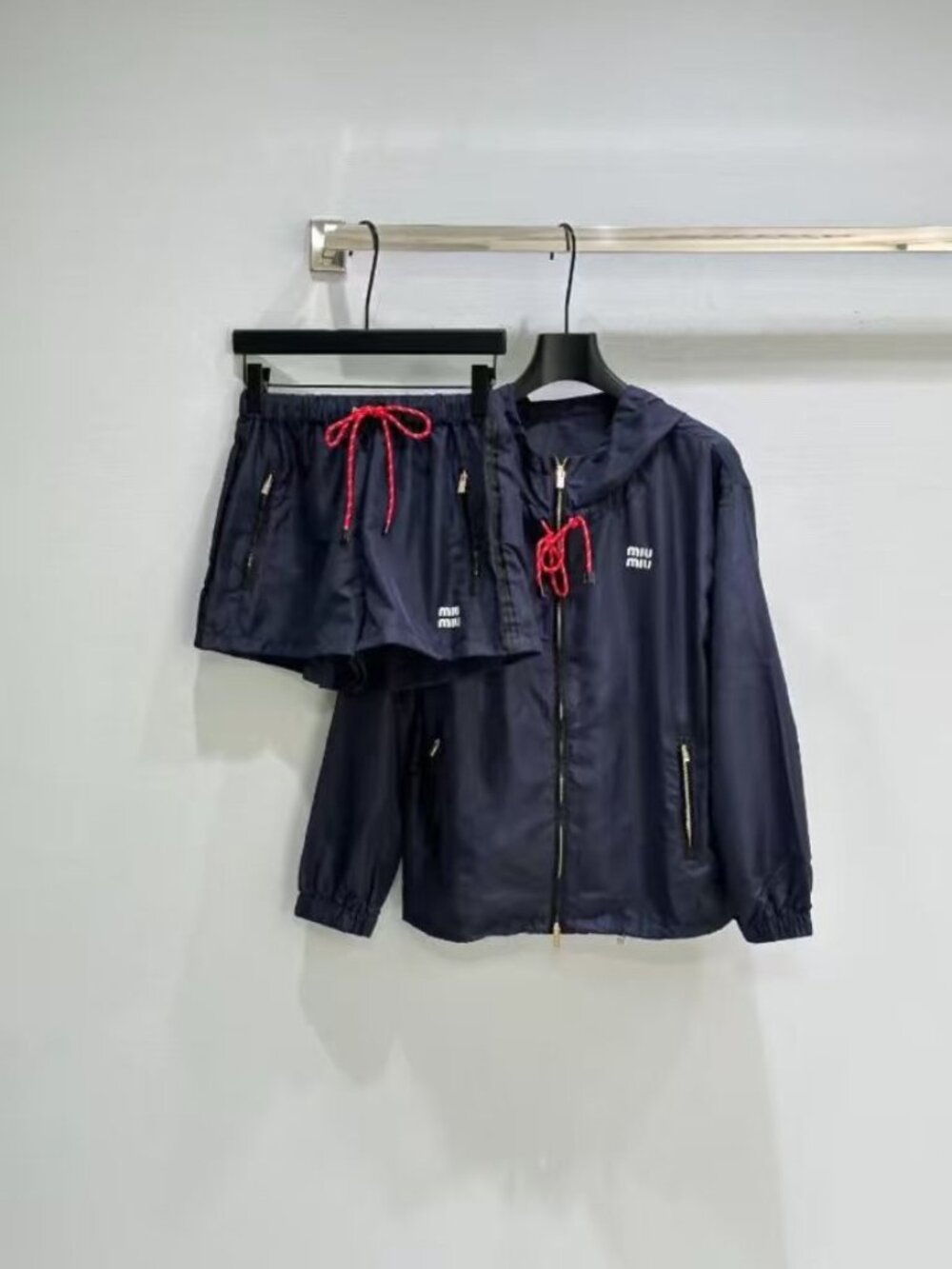 MIUMIU trench coat and shorts, well-tailored